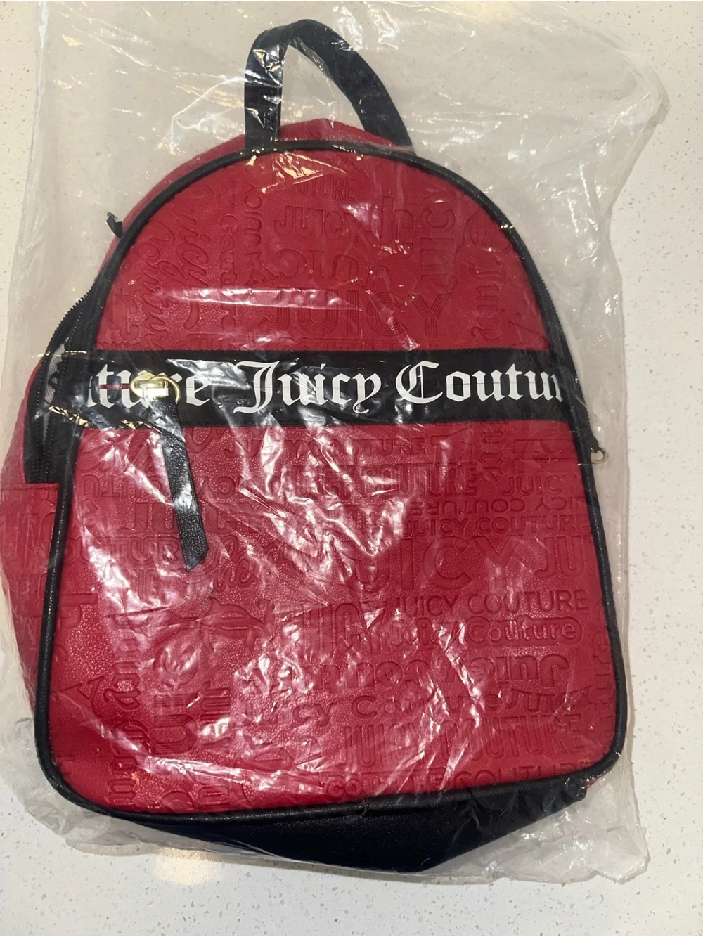 Juicy Couture Red Embossedi Mini Backpack with Black Trim, New without Tags!